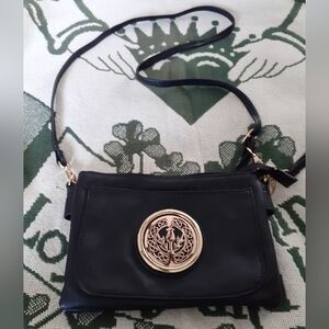 Elegant Black Crossbody Bag with Gold Detail